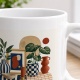 Tasse mit Wohnillustration