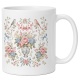 Tasse mit Blumenkranz und Vögeln