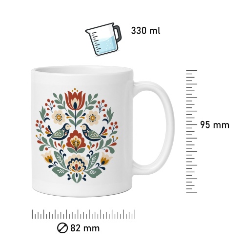 Tasse mit Blumen- und Vogelmotiv