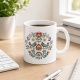 Tasse mit Blumen- und Vogelmotiv