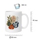 Tasse mit botanischer Blätterillustration