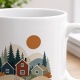 Tasse mit Waldhaus-Motiv