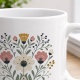 Tasse mit Blumenillustration