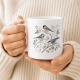 Tasse mit Vogelmotiv