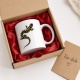 Tasse mit Salamander-Motiv